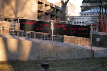 *Jacqueline Kiyomi Gork: Poems of Electronic Air*, ramp sign, Carpenter Center for the Visual Arts, Harvard University, 2024. Photo by Willis Kingery